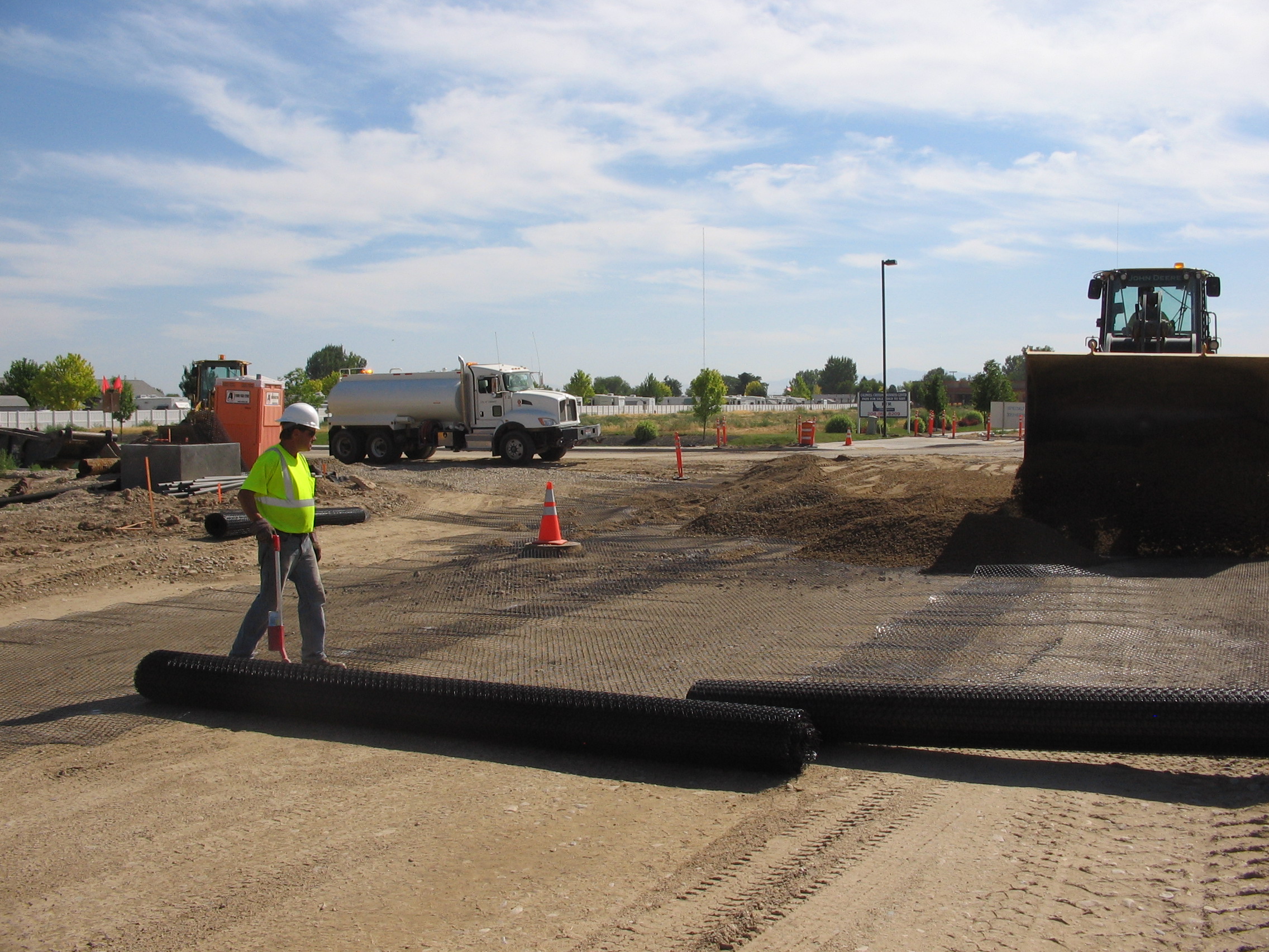 Photo of a construction crew building a road.