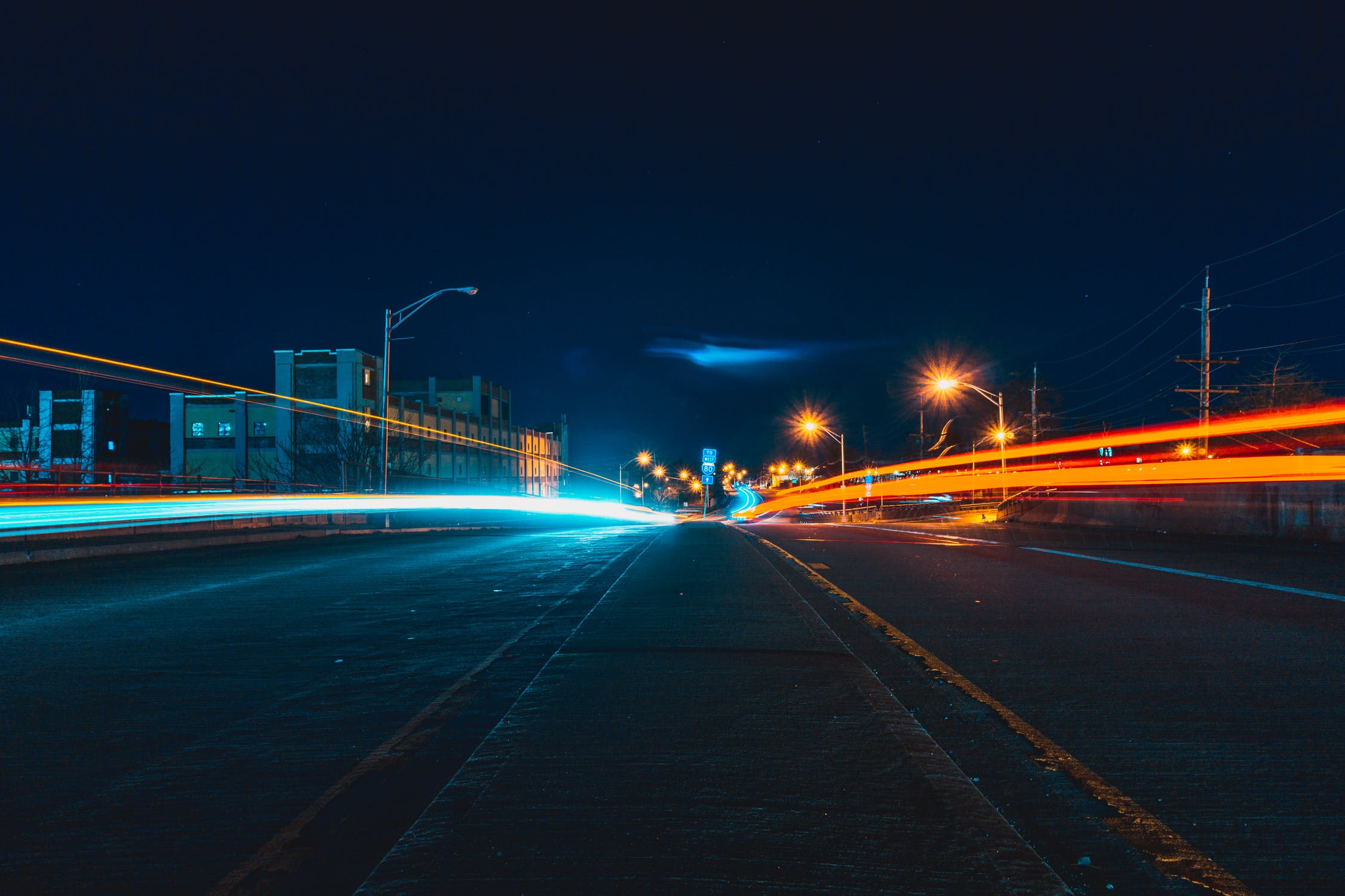 road-with-time-lapse-lights